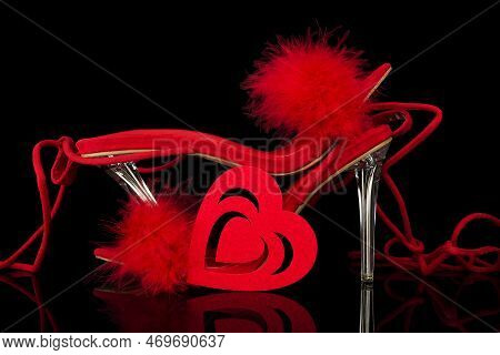 Sexy, Red Strappy High Heel Shoes With Box On A Black Background