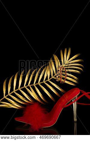 Sexy, Red Strappy High Heel Shoes With Box On A Black Background