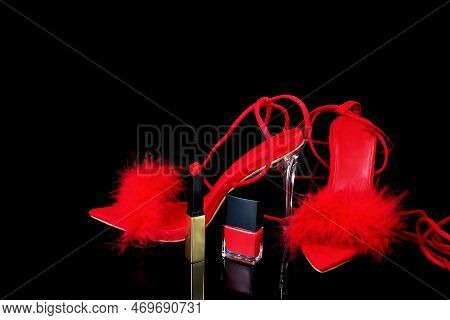 Sexy, Red Strappy High Heel Shoes With Box On A Black Background