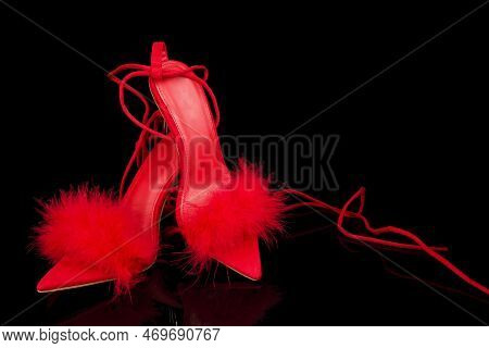 Sexy, Red Strappy High Heel Shoes With Box On A Black Background