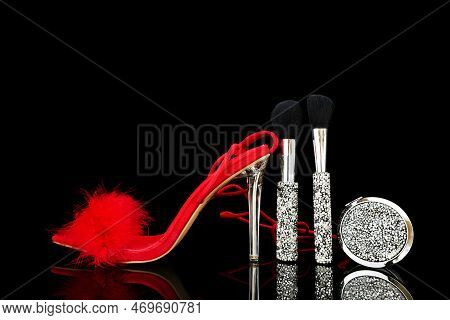 Sexy, Red Strappy High Heel Shoes With Box On A Black Background