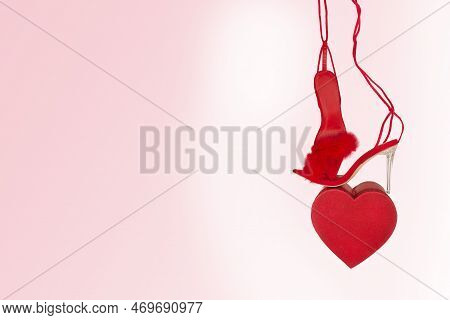 Sexy, Red Strappy High Heel Shoes With Box On A White Background
