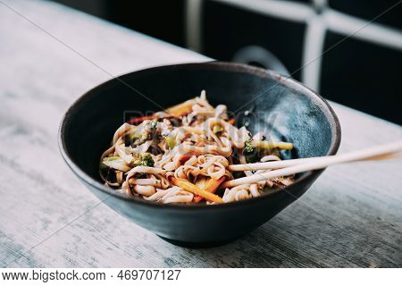 View Osf Asian Noodles Udon With Pork Close-up In A Bowl On The Table.
