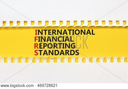 Ifrs Symbol. Concept Words Ifrs International Financial Reporting Standards On Paper On Beautiful Wh