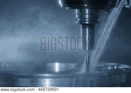 The  Cnc Milling Machine Cutting The Magnesium Alloy Wheel Part With Ball End Mill Tool. The Nylon A