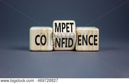 Competence And Confidence Symbol. Concept Word Competence Confidence On Wooden Cubes. Beautiful Grey