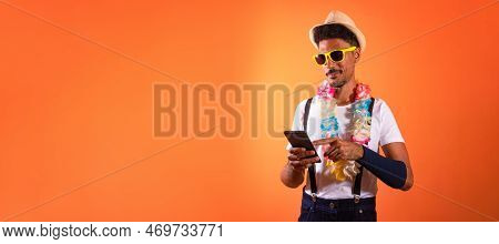 Carnival Brazilian Outfit. Black Man With Carnival Costume Holding Mobile