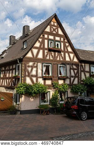 Runkel, Germany - June 03,2020: Old Half-timbered House With Vine