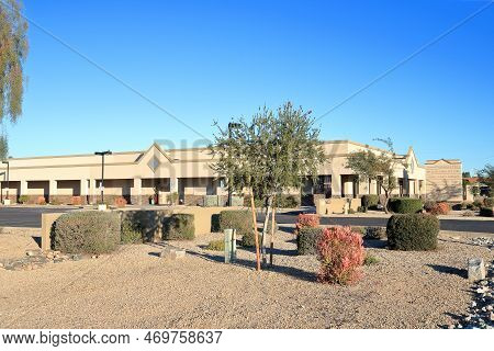 Phoenix, Az - January 29, 2022:  Accent Professional Plaza With Desert Style Xeriscaped Front Yard N