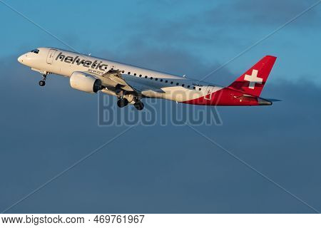 Zurich, Switzerland, January 19, 2023 Helvetic Airways Embraer E190-e2 Aircraft Is Taking Off From R