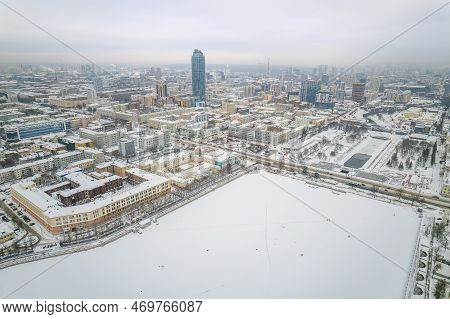 Embankment Of The Central Pond And Plotinka In Yekaterinburg At Winter Sunset. The Historic Center O