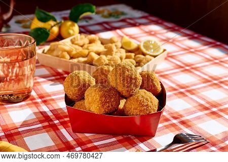 Typical Sicilian Street Food Arancini (deep Fried Rice Balls With Meat) On Paper Plate Take Out. Unh
