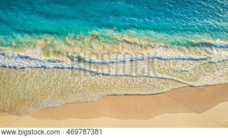 Top View. Relaxing Aerial Beach Scene, Summer Vacation Holiday Template. Waves Surf With Amazing Blu