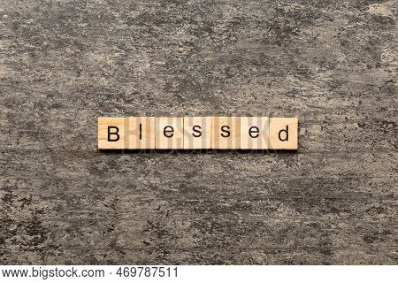 Blessed Word Written On Wood Block. Blessed Text On Table, Concept.