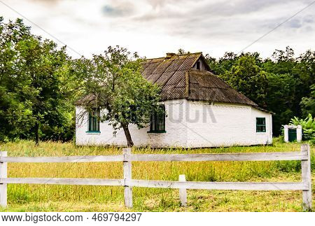 Beautiful Old Abandoned Building Farm House In Countryside On Natural Background