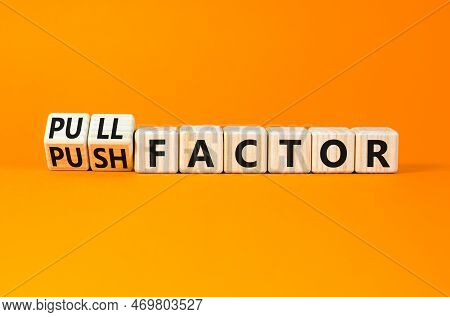 Pull Or Push Factor Symbol. Concept Word Pull Factor And Push Factor On Wooden Cubes. Beautiful Oran