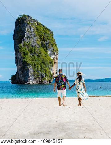 Koh Poda Beach Krabi Thailand, The Tropical Beach Of Koh Poda, A Couple Of Men And Woman On The Beac
