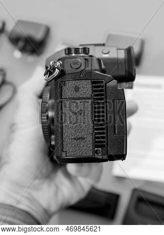 Paris, France - Nov 20, 2022: Hand Holding Covered Hdmi Connection Ports On New Panasonic Lumix Dmc-