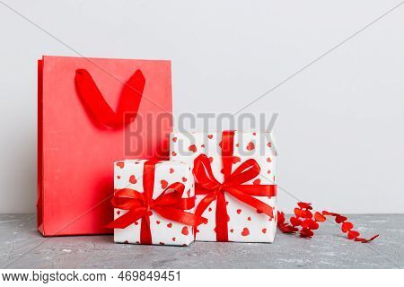 Mobile Phone With Blank Screen On Colored Background With Hearts, Calendar And Gift Box, Valentine D