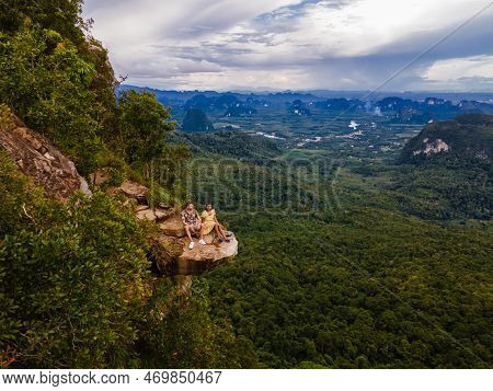 Couple Men And Women At The Edge Of A Mountain, Dragon Crest Mountain Krabi Thailand
