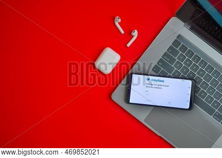 Tula, Russia - November 19, 2021:onlyfans Sign In Web Page Displayed On A Smartphone Near Modern Lap