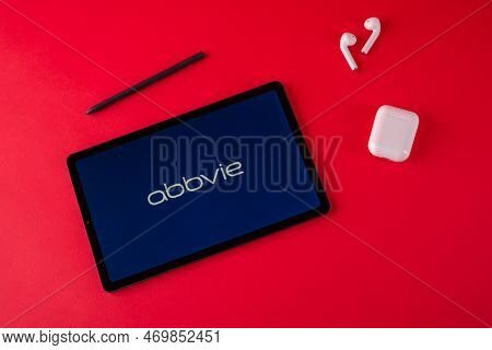 Tula, Russia - October 19, 2021: Abbvie Inc Displayed Modern Laptop On Red Background