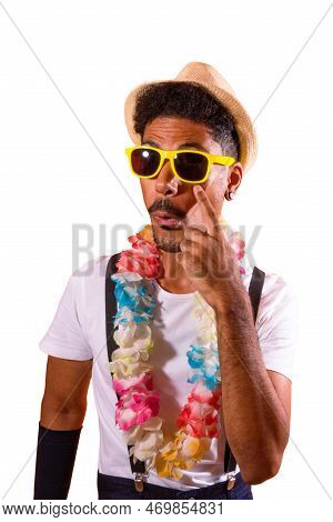 Portrait Of Black Man With Carnival Props Isolated On Orange Background.