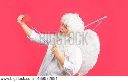 Cupid In Valentines Day With Red Paper Heart. Male Angel With Bow And Arrow. Arrows Of Love.
