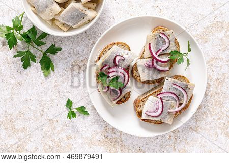 Herring Sandwich. Open Sandwiches With Whole Grain Bread, Herring And Onion. Top View