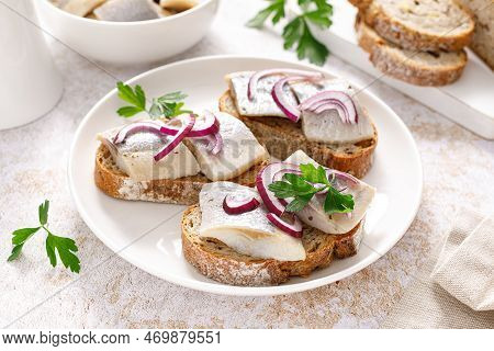Herring Sandwich. Open Sandwiches With Whole Grain Bread, Herring And Onion