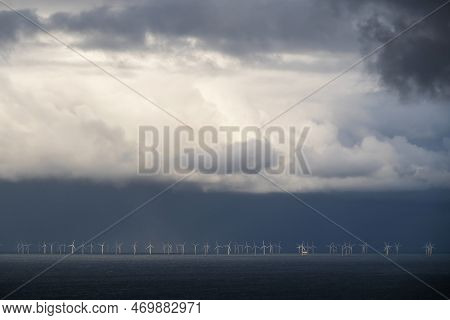 Offshore Wind Farm. A Large Wind Farm With A Large Number Of Wind Turbines.
