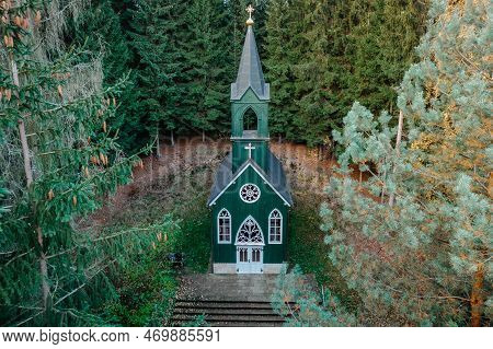 Aerial View Of Wooden Rural Chapel Called Tichackova Kaple In Broumovsko Region,czech Republic.catho