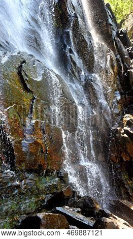 Closeup Photo, Taken At An Angle, Shows Spray Of Hickory Nut Falls, Chimney Rock State Park, North C