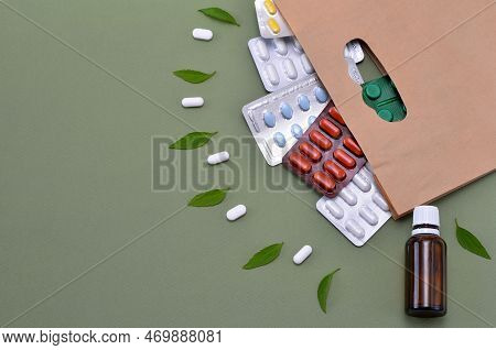 Image Presenting Medicine Based On Natural Ingredients, Pills And Green Leaves