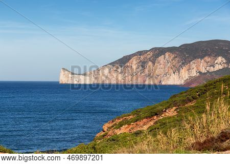 Rocky Cliffs On The Sea Coast. Sardinia, Italy. Nature Background