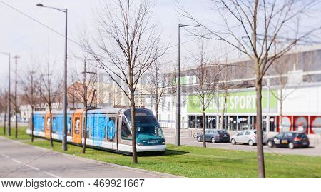 Strasbourg, France - Mar 28, 2015: Tilt-shift Lens View Of New Tramway Operated By Cts In Motion Nea