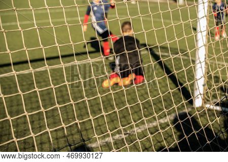 Stock Image Kid Game Football. Difocused Image