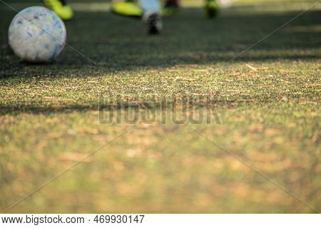 Stock Image Kid Game Football. Difocused Image