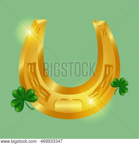 Lucky Horseshoe And Clover. Golden Shiny Horseshoe With Clover Shamrock On A Green Background. Happy