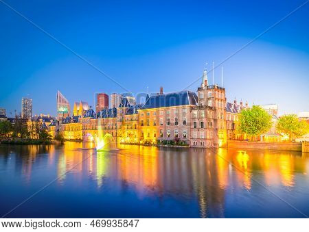 View Of Binnenhof - Dutch Parliament At Night Over Hofvijver Pond At Night, Hague Holland, Toned