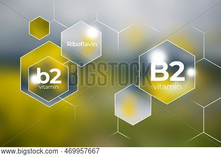 Molecular Model Of Vitamin B2, Riboflavin. Hexagons With Vitamin B2 Name, Blurry Background.