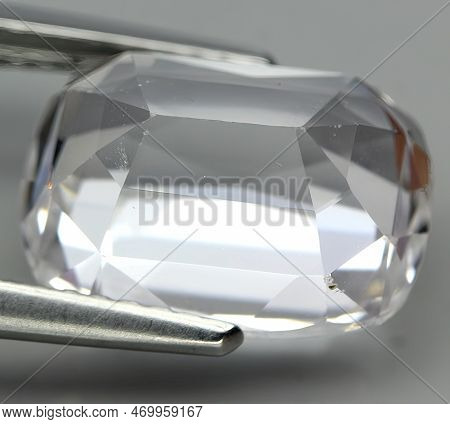 Natural Precious Pink Kunzite Stone On Gray Background