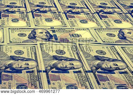One Hundred American Dollars Background. Many Bills. A Pile Of Us Dollars Banknotes. Money Texture. 
