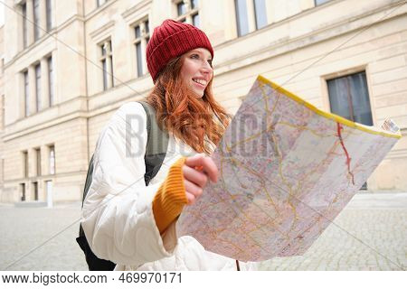 Redhead Girl, Tourist Explores City, Looks At Paper Map To Find Way For Historical Landmarks, Woman 