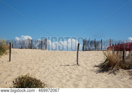 Pathway Fence Sand Coast Ocean Beach Sea In South West Arcachon Bay In Atlantic French Coast In Lege