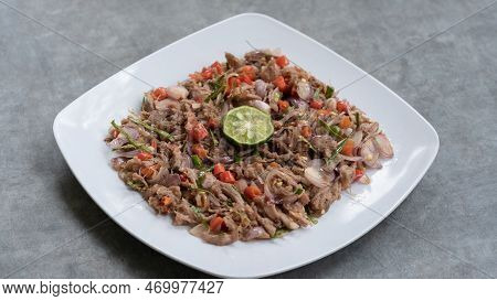Chicken Or Beef With Traditional Indonesian Sambal. Onions, Chilies, Coconut Oil, Lime Leaves, Salt.
