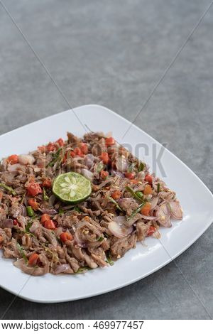 Chicken Or Beef With Traditional Indonesian Sambal. Onions, Chilies, Coconut Oil, Lime Leaves, Salt.