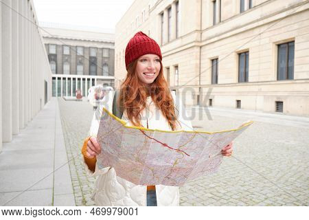 Redhead Girl, Tourist Explores City, Looks At Paper Map To Find Way For Historical Landmarks, Woman 