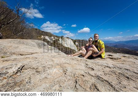 Beautiful Landscape Of Hierve El Agua Mountanis With Young Caucasian Couple Relaxing, Waterfalls Oax