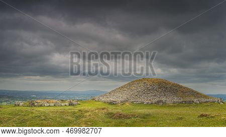 Ancient, Neolithic Burial Chambers And Stone Circles Of Loughcrew Cairns With Dramatic, Dark, Storm 